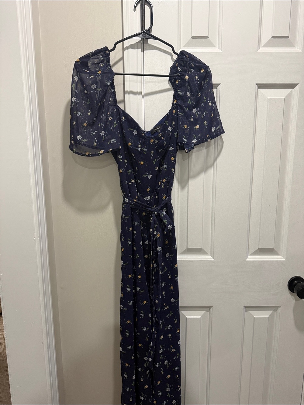 Blossoms Navy Blue Floral Print Flutter
Sleeve Jumpsuit